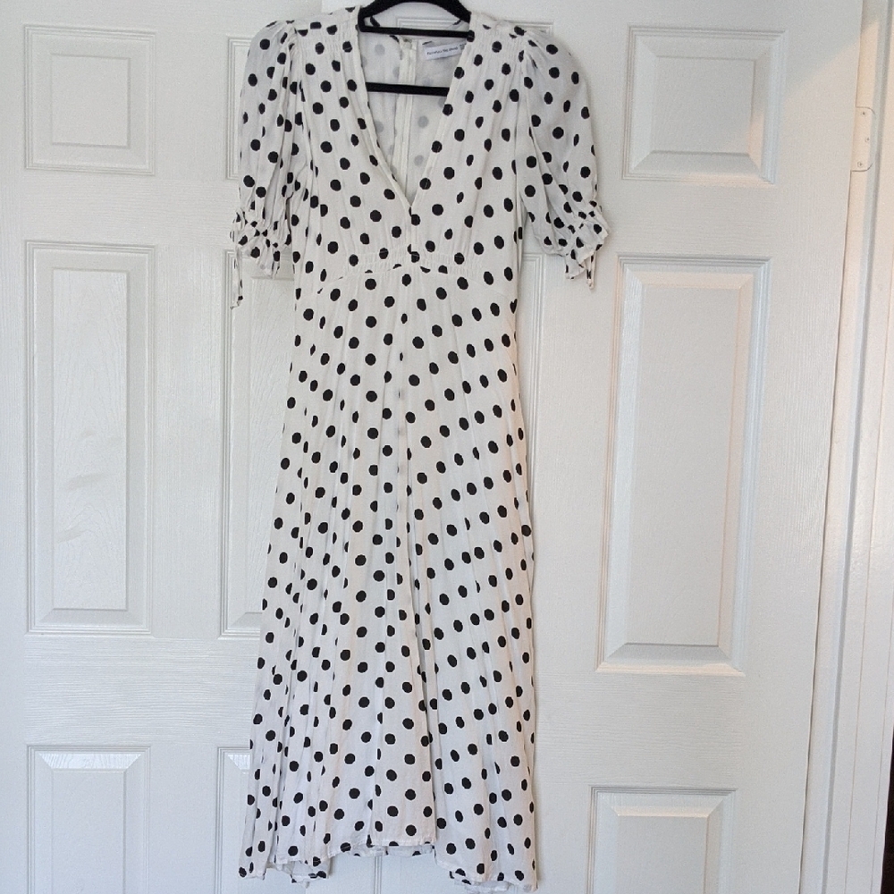 Faithfull the Brand Black and White Puff Sleeve Wrap Midi Dress